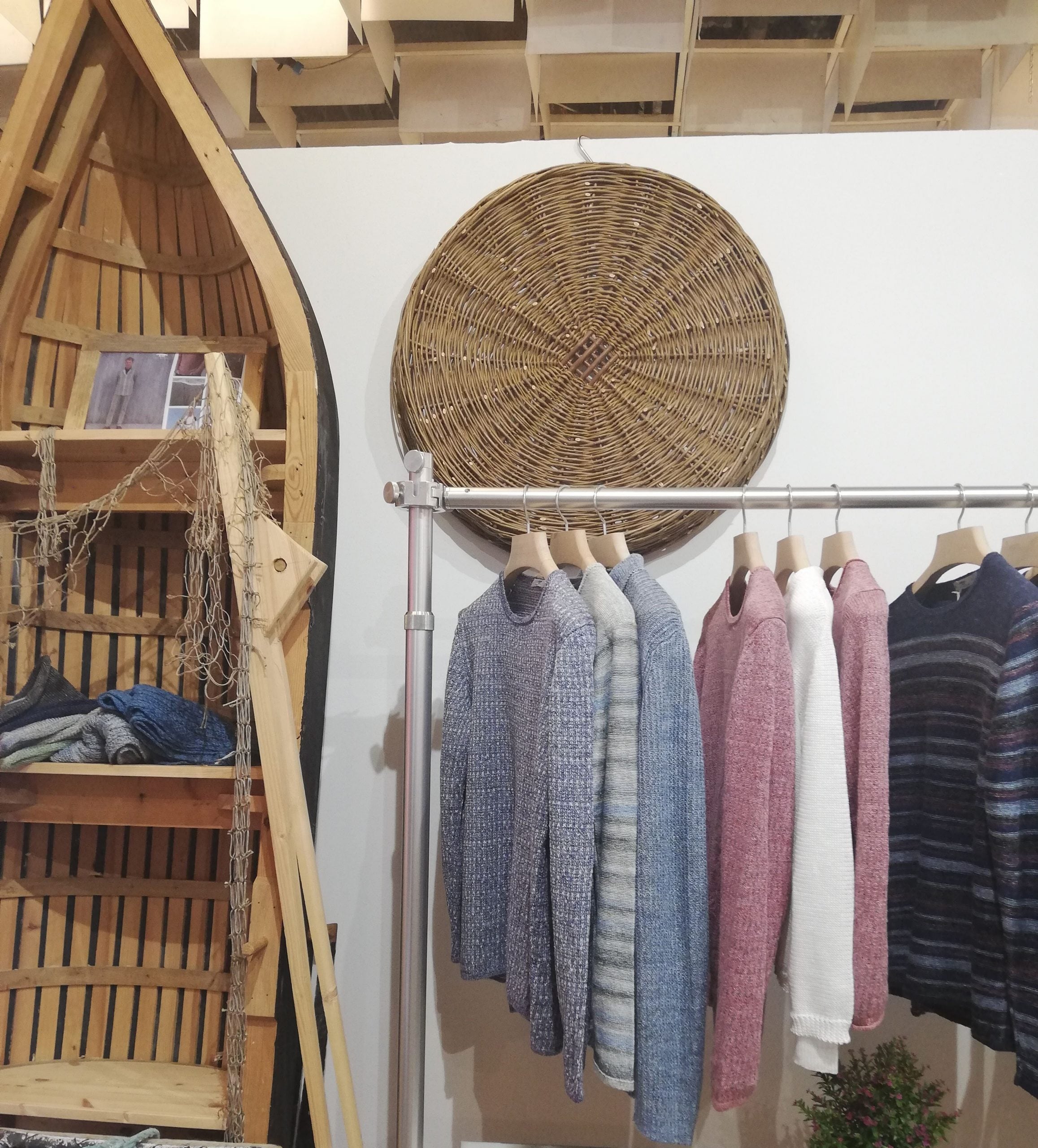 A shot of our Pitti Uomo 94 stand, which shows a classic Inis Meáin currach and our new SS19 collection of linen sweaters.